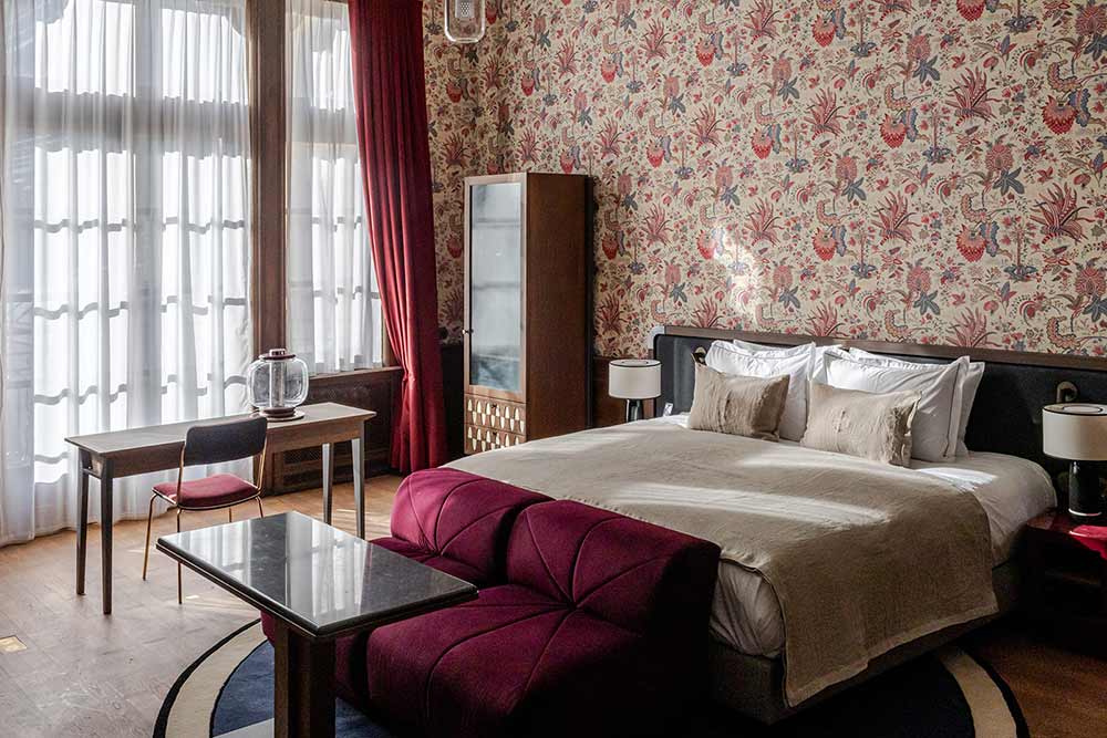 Suite Héritage et son confortable lit.