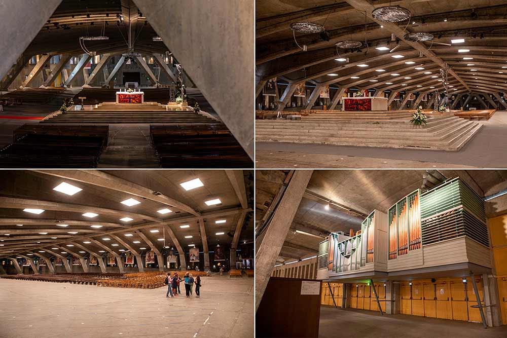 Nef monumentale, autel central et orgue intégré dans une architecture en béton assez impressionnante.